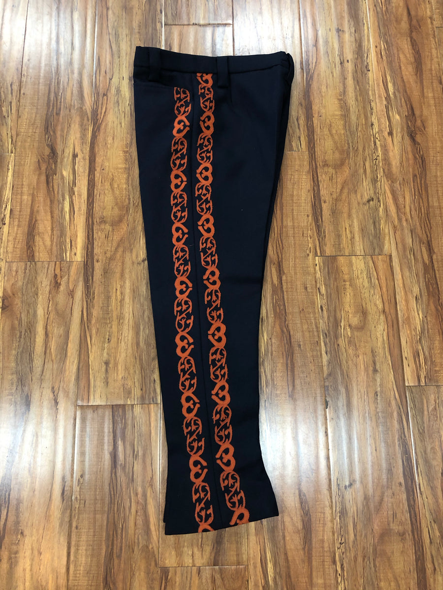 PANTALON DE CHARRO. AUTHENTIC CHARRO PANTS THAT ARE DARK HEAVY WOOL NAVY COLOR WITH CARROTS SUEDE LEATHER STITCHED STENCIL ART WORK , HerraduraDeOro - HerraduraDeOro