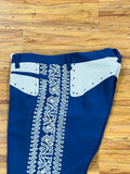 PANTALONES DE CHARRO CON GRECA. AUTHENTIC CHARRO PANTS THAT ARE DODGER BLUE COLOR WITH BONE SUEDE LEATHER STITCHED STENCEIL ART WORK