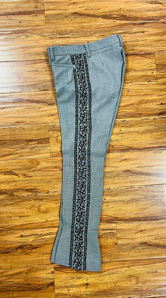 PANTALONES DE CHARRO CON GRECA. AUTHENTIC CHARRO PANTS THAT ARE GRAY COLOR WITH BLACK SUEDE LEATHER STITCHED STENCEIL ART WORK