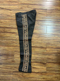 PANTALONES DE CHARRO CON GRECA. AUTHENTIC CHARRO PANTS THAT ARE BROWN COLOR WITH TAN SUEDE LEATHER STITCHED STENCEIL ART WORK