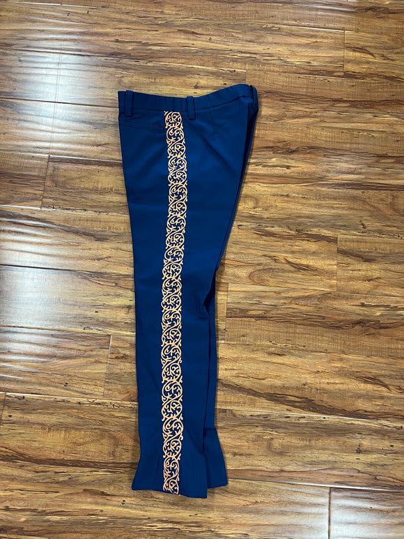 PANTALONES DE CHARRO CON GRECA. AUTHENTIC CHARRO PANTS THAT ARE BLUE COLOR WITH TAN SUEDE LEATHER STITCHED STENCEIL ART WORK