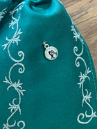 MOŇO CHARRO COLOR VERDE BORDADO EN HILO PLATA