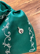 MOŇO CHARRO COLOR VERDE BORDADO EN HILO PLATA