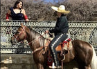 PANTALON DE CHARRO. AUTHENTIC CHARRO PANTS THAT ARE ORANGE WITH MOCA BROWN SUEDE LEATHER STITCHED STENCIL ART WORK