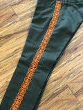 PANTALONES DE CHARRO CON GRECA. AUTHENTIC CHARRO PANTS THAT ARE GREEN COLOR WITH CARROT SUEDE LEATHER STITCHED STENCEIL ART WORK