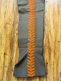 PANTALONES DE CHARRO. AUTHENTIC CHARRO PANTS THAT ARE BROWN WITH CARROT SUEDE LEATHER STITCHED STENCIL ART WORK
