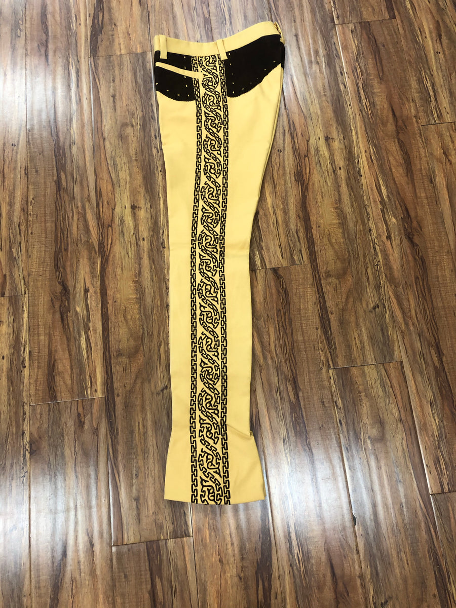 PANTALONES DE CHARRO. AUTHENTIC CHARRO PANTS THAT ARE YELLOW  WITH BROWN SUEDE LEATHER STITCHED STENCIL ART WORK , HerraduraDeOro - HerraduraDeOro